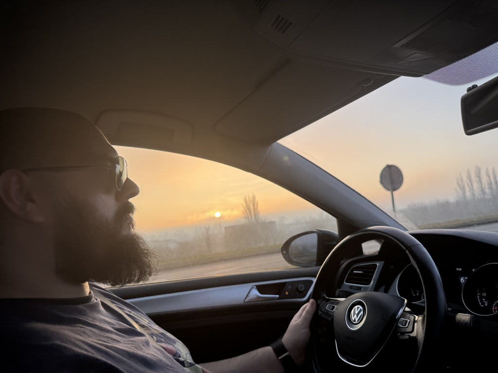 Driving toward a sunset