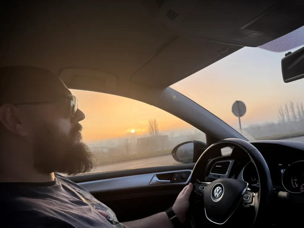 Driving toward a sunset